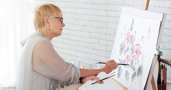 older woman painting