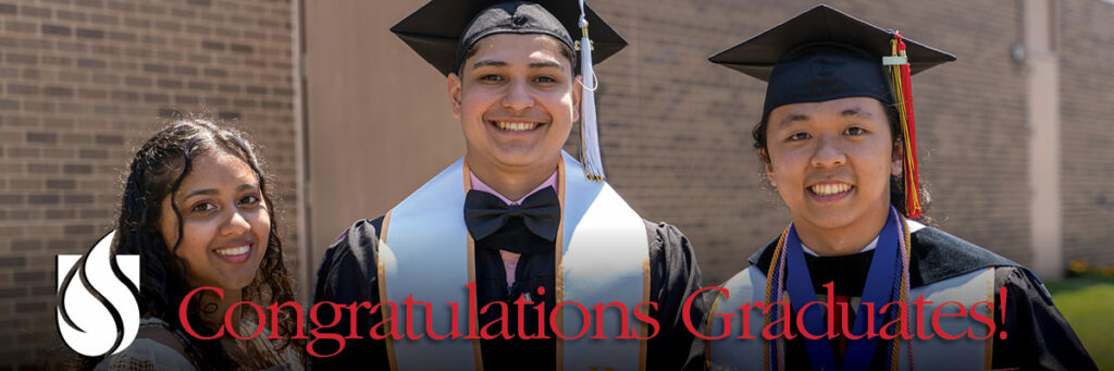 3 smiling union college graduates facing the camera.