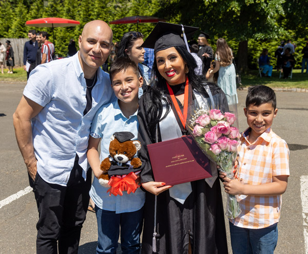 happy union graduate posing with family