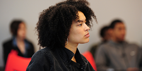 female student staring off into the distance