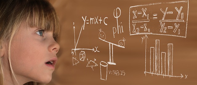 child looking at math formulas