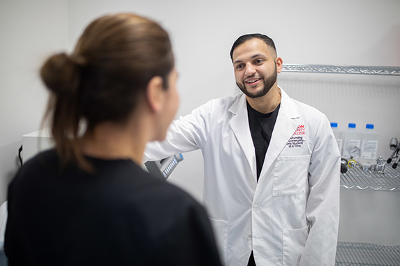 Two physicians conversing